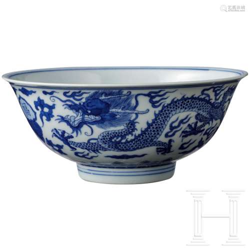 A charming blue and white dragon bowl with Kangxi mark,