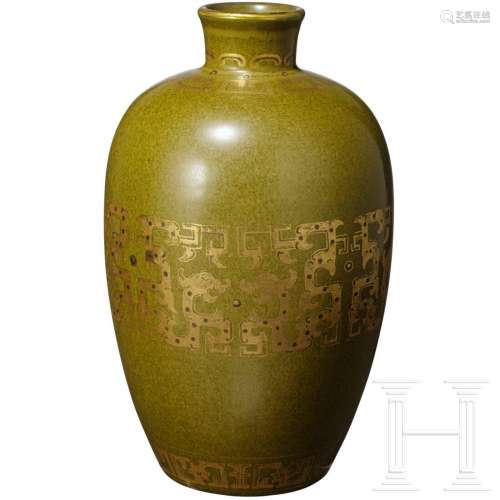 A tea-dust glazed dragon vase with gilt decor and