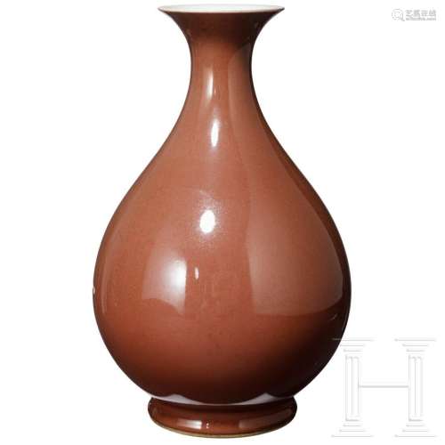 A red-glazed Yuhuchun vase with Qianlong six-character