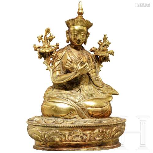 A gilded Sino-Tibetan Lama statuette, 19th - 20th