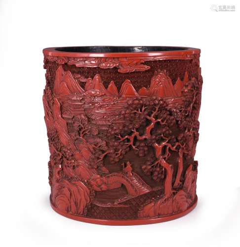 A CARVED CINNABAR LACQUER BRUSHPOT
