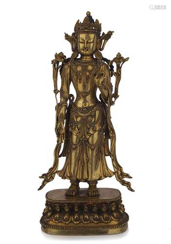 A BRONZE-GILT STANDING PADMAPANI