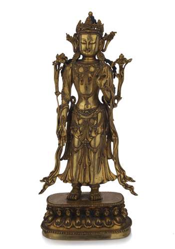 A BRONZE-GILT STANDING PADMAPANI