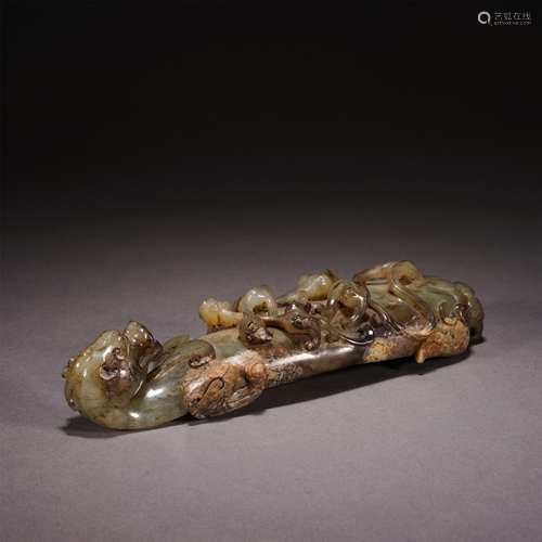 A CARVED RUSSET JADE CHILONG BELTHOOK