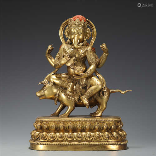 A RARE TIBETAN GILT-BRONZE GANESHA