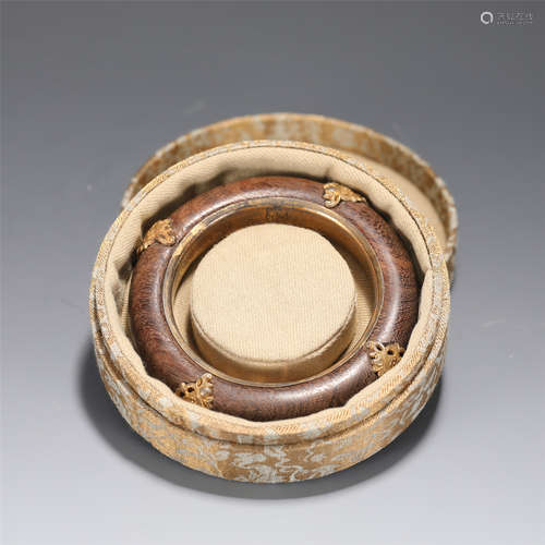 AN ALOES-WOOD BANGLE WITH BOX