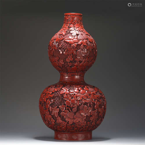 A CARVED CINNABAR LACQUER DOUBLE GOURDS VASE