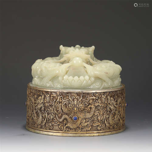 A CARVED WHITE JADE DRAGON SEAL