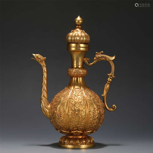 A GILT-BRONZE LOTUS SCROLLS EWER