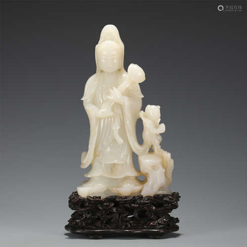 A FINE CARVED WHITE JADE STANDING GUANYIN WITH ACOLYTE