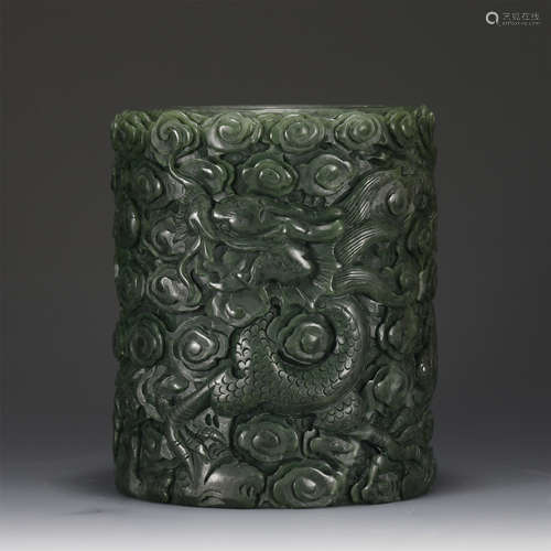 A CARVED SPINACH GREEN JADE BRUSHPOT