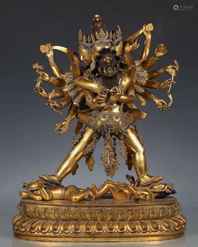 A GILT-BRONZE STANDING CAKRASAM-VARA