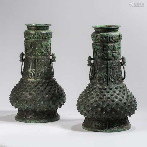 PAIR OF ARCHAIC BRONZE DOUBLE-HANDLED VESSELS