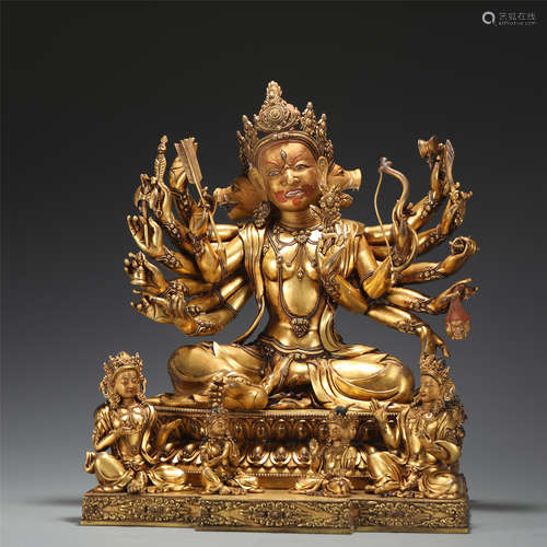 LARGE GILT-BRONZE SEATED PROTECTOR