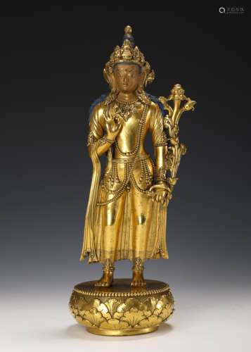 A GILT-BRONZE STANDING PADMAPANI