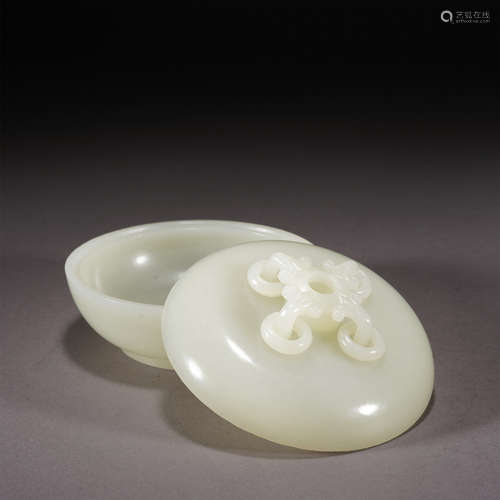 A CARVED WHITE JADE CIRCULAR BOX WITH COVER