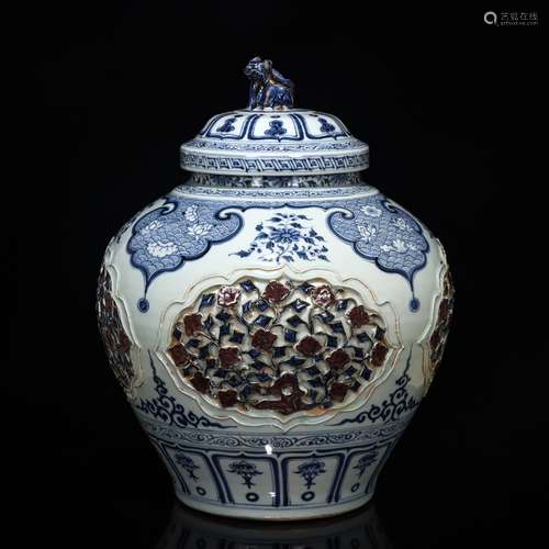 AN UNDERGLAZE BLUE AND COPPER RED JAR WITH COVER