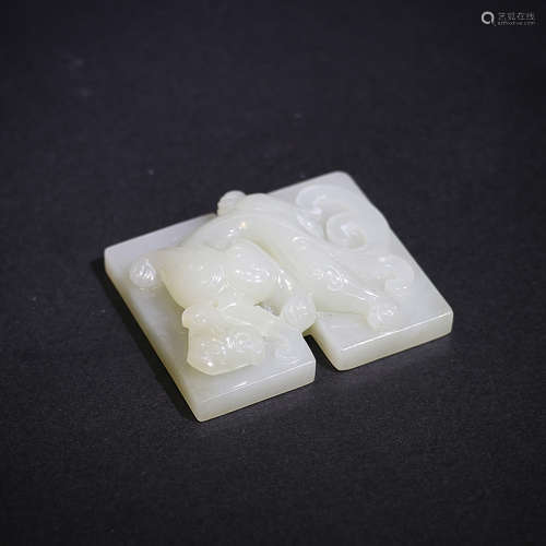 A CARVED WHITE JADE CHILONG PENDANT