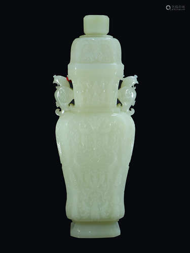 A CARVED WHITE JADE VASE WITH COVER