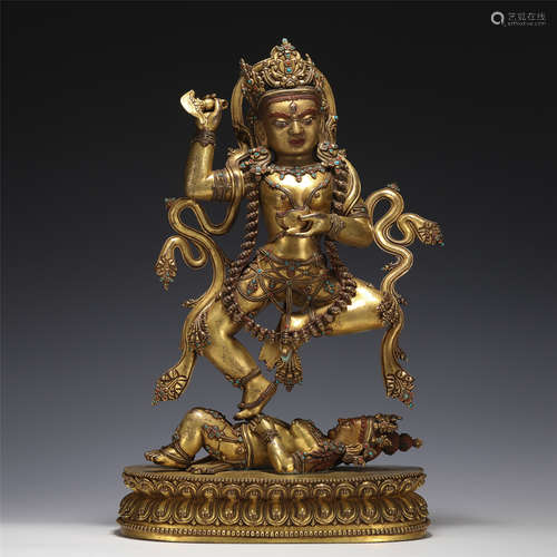 A RARE TIBETAN BRONZE-GILT VAJRAVARAHI