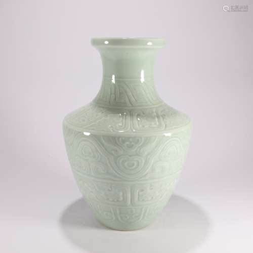 A Pea Green Glaze Cloud Pattern Carved Porcelain Zun