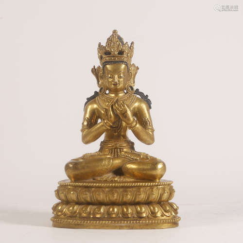 A Gilt Bronze Seated Guanyin Statue