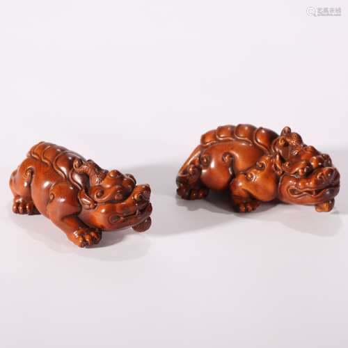 A Pair of Boxwood Carved Beast Ornaments