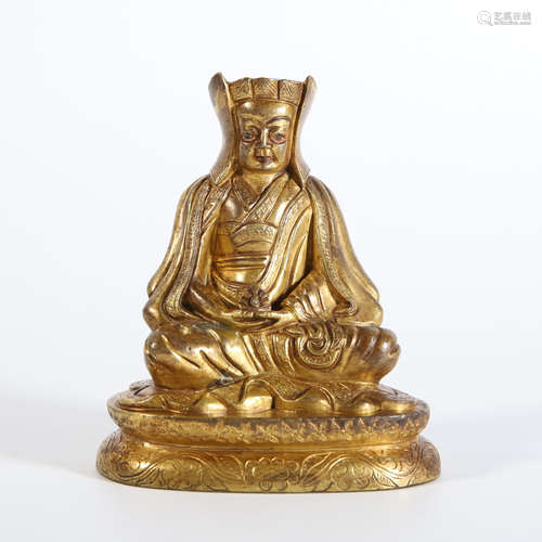 A Gilt Bronze Guru Buddha Statue