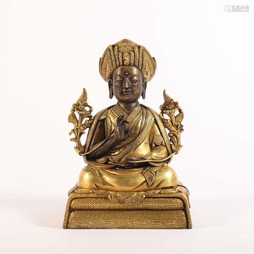 A Gilt Bronze Guru Buddha Statue