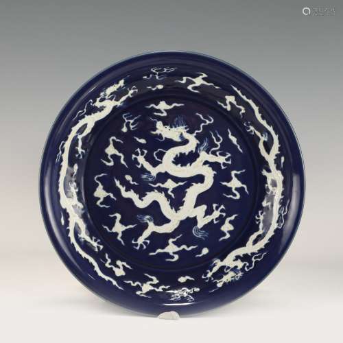 MING REVERSED BLUE AND WHITE DRAGON PLATE
