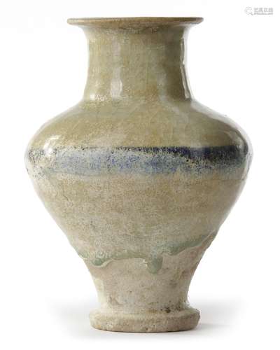 A RAQQA BLUE AND WHITE POTTERY JAR, SYRIA, 13TH CENTURY