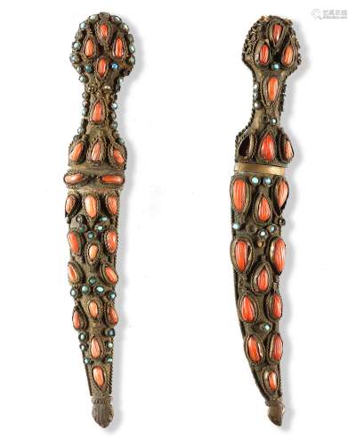 A PAIR OF CORAL AND TURQUOISE INSET GOLD-DAMASCE…