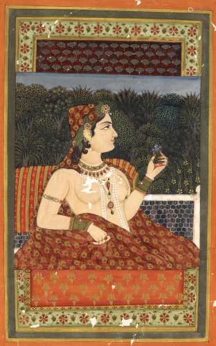 A PRINCES SEATED ON A TERRACE OVERLOOKING THE GARD…