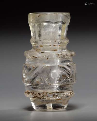 A FRAGMENTARY FATIMID ROCK CRYSTAL BOTTLE, EGYPT,