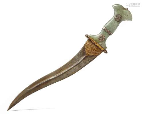 A MUGHAL CARVED JADE-HILTED DAGGER (KHANJAR) WITH