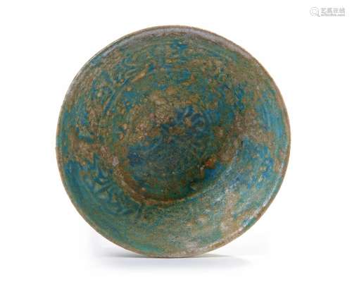 A KASHAN TURQUOISE GLAZED BOWL, PERSIA, 12TH CENT…