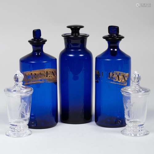 Three Blue Glass Apothecary Jars and a Pair of Steuben