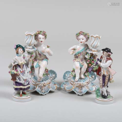 Pair of Chelsea Style Porcelain Figural Candlesticks