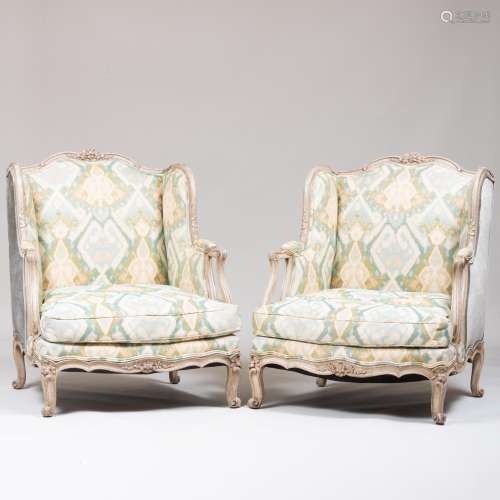 Pair of Louis XV Style White Painted Winged Bergè