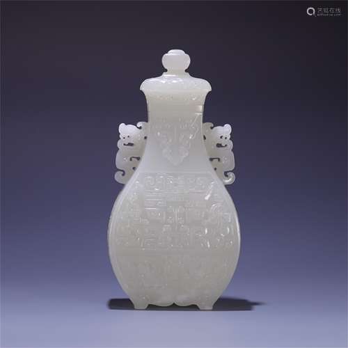 A Chinese Carved Jade Dragon Ear Vase with Lid