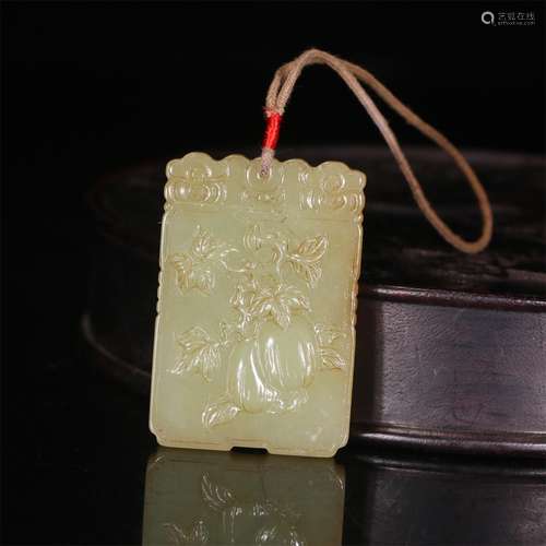 A Chinese Melon Shaped Carved Jade Pendant