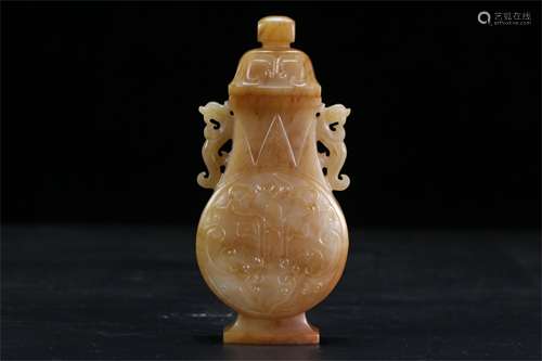 A Chinese Jade Lidded Vase with Dragon Ear