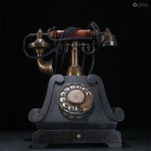 A Chinese Bronze Telephone