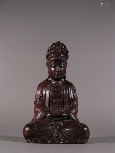 A Chinese Carved Agarwood Guanyin Statue