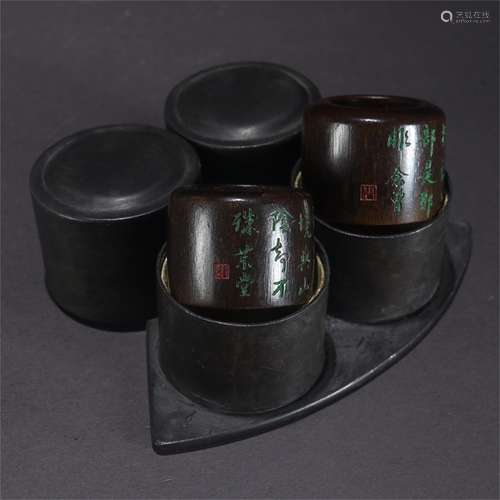 A Pair of Chinese Carved Agarwood Thumb Rings