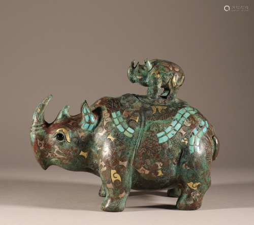 Bronze rhinoceros statue inlaid with pine stone in the war H...