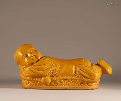 Ding kiln yellow glazed child pillow in Song Dynasty