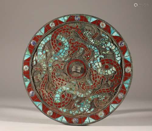 Bronze mirror inlaid with pine stone in the war and Han Dyna...