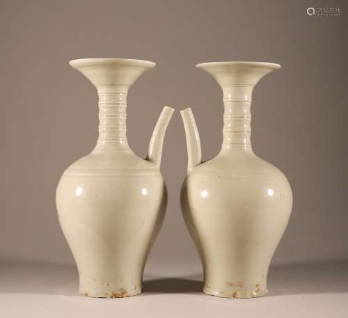 A pair of white glazed clean bottles from Ding kiln in Song ...