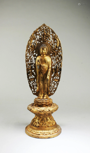 A Qianlong heavy gilt bronze Buddha